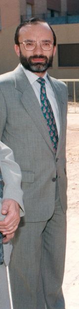 An image of Ramón Tejedor in a grey coat and blue tie, 1995