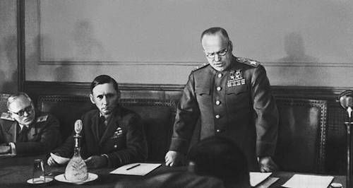 Arthur Tedder (centre left) at the ceremony of the German unconditional surrender (May 1945). Standing is Soviet Marshal Zhukov reading the act of surrender.