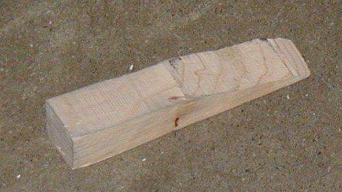 File:Wooden wedge door stop.jpg