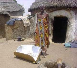 File:Solar-Panel-Cooker-in-front-of-hut.jpg