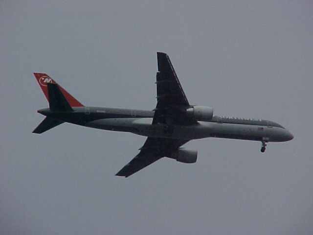 File:NWA Plane over Lake Harriet 020623.JPG