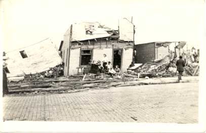 File:Downtown stores damaged by cyclone.jpg