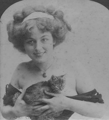 File:Girl holding cat 1900.png