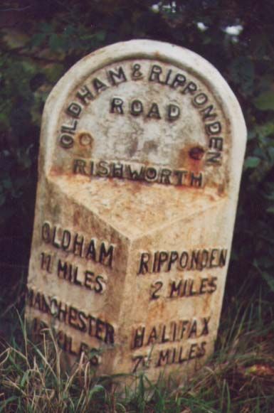 File:Milestone opposite Don Marie Booth Wood.jpg