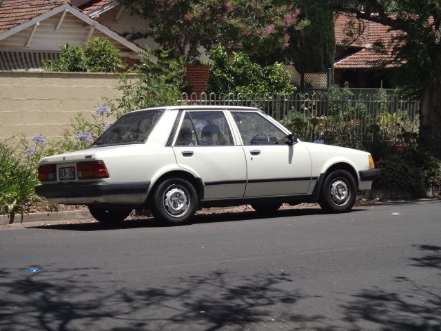 File:1981-1982 Mazda 323 (BD) Deluxe sedan (8302481590).jpg