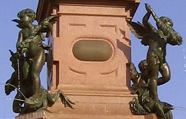 Mende fountain, the Putti at the base of the Obelisk