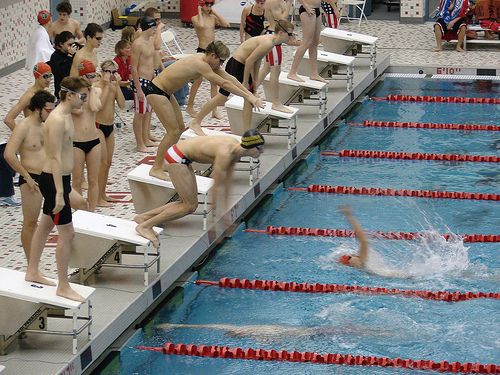 File:Swimming relay exchange.jpg