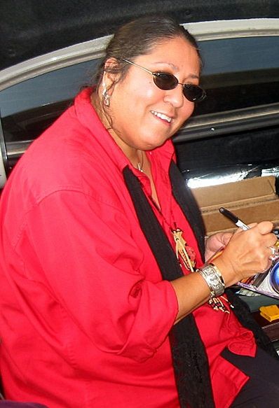 File:Mary signs a CD cropped.jpg