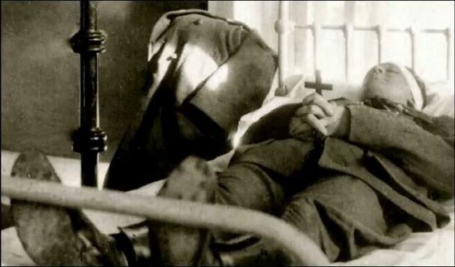 File:Michael Collins body lying in hospital.jpg