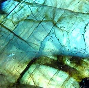 Detail of labradorite feldspar displaying typical labradorescence.