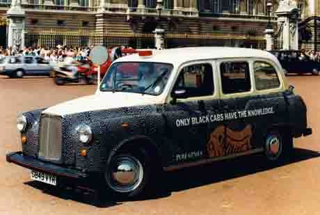 File:Carbodies Fairway in Guinness livery.jpg