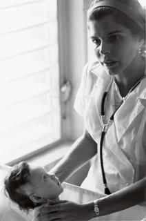 File:Helen-rodriguez-trias-taking-care-of-a-newborn.jpg