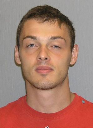 File:Mikhail Semenko mug shot.jpg