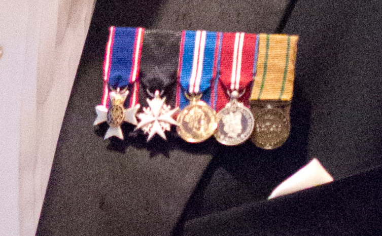 File:Miniature medals with black tie.png