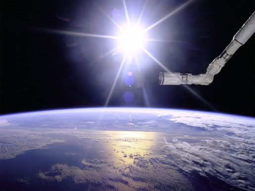 File:Robot Arm Over Earth with Sunburst.jpg