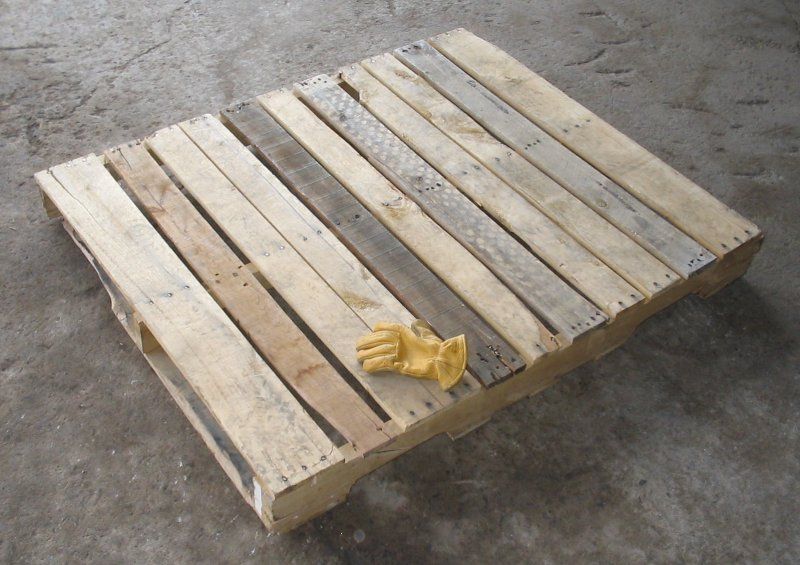 File:Wooden pallet with glove.jpg