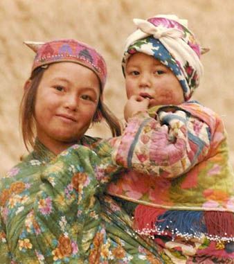 File:Turkmen girl and baby.jpg