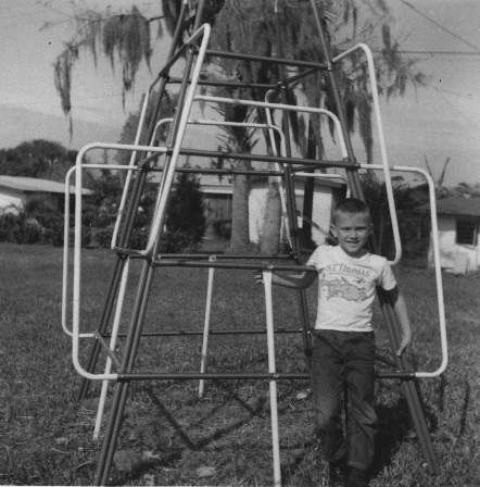 File:Boy in front of jungle gym, 1967.jpg