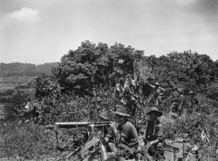 File:MG firing on Tarakan Hill.jpg