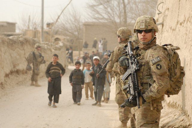 File:Afghan village patrol.jpg