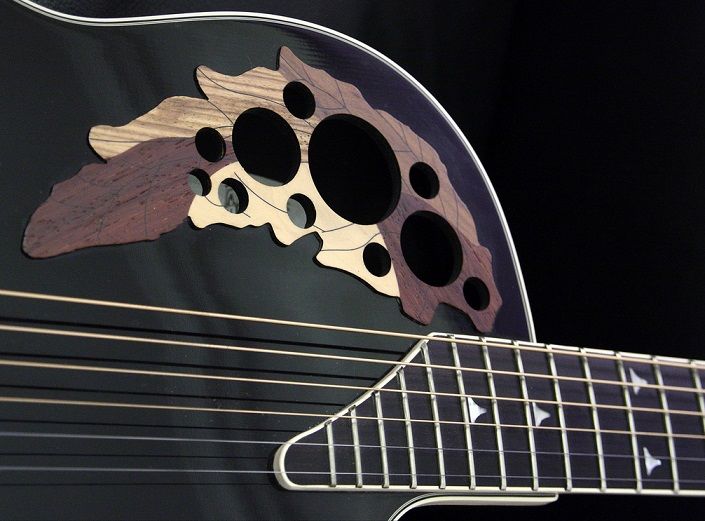 File:Ovation guitar sound holes horizontal.jpg