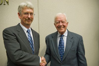 Dave Johnson shaking Jimmy Carter's hand at the 2007 Carter Center Human Rights Defenders conference at the Carter Center in Atlanta.