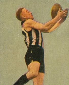 File:Alan 'Ginger' Ryan marking a football.jpg