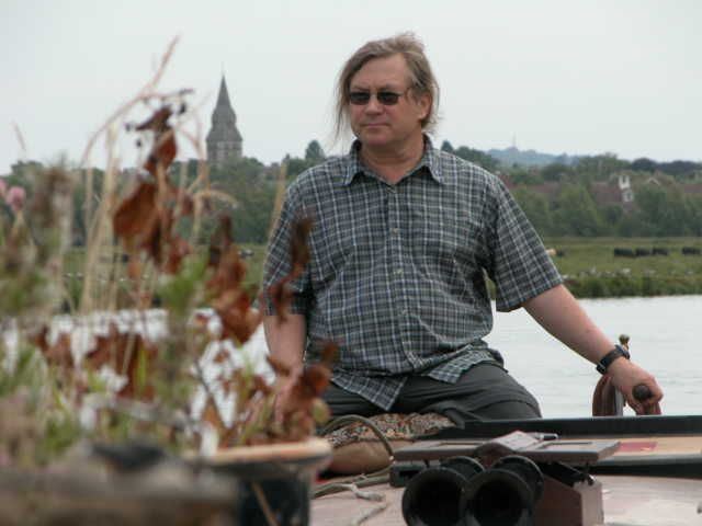 File:Captain Tom on his narrowboat.jpg