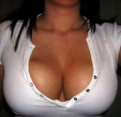 File:Cleavage in tight white shirt.jpg