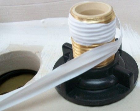 File:Teflon tape wound around threaded pipe.jpg