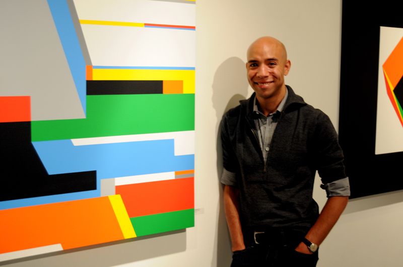 File:Bryce-hudson-standing-next-to-one-of-his-large-geometric-paintings.jpg