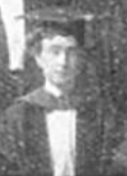 A grainy image of a white woman, seated, wearing academic cap and gown