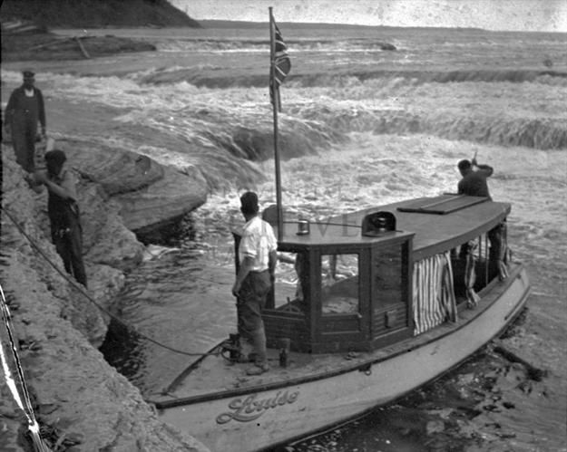 File:Boat moored by the Vermilion Chutes.jpg