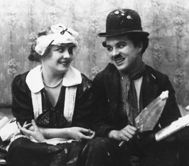 File:Chaplin and Purviance in Work.jpg