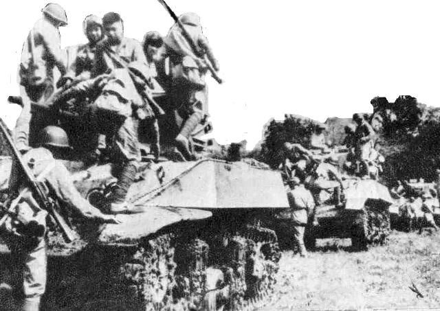 File:Chinese troops on US tanks3.jpg