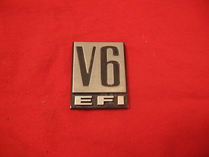 File:Dodge V6 EFI fender badge.jpg