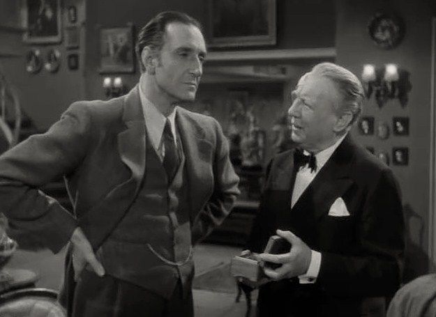 File:Basil Rathbone-Edmund Breon in Dressed to Kill.jpg