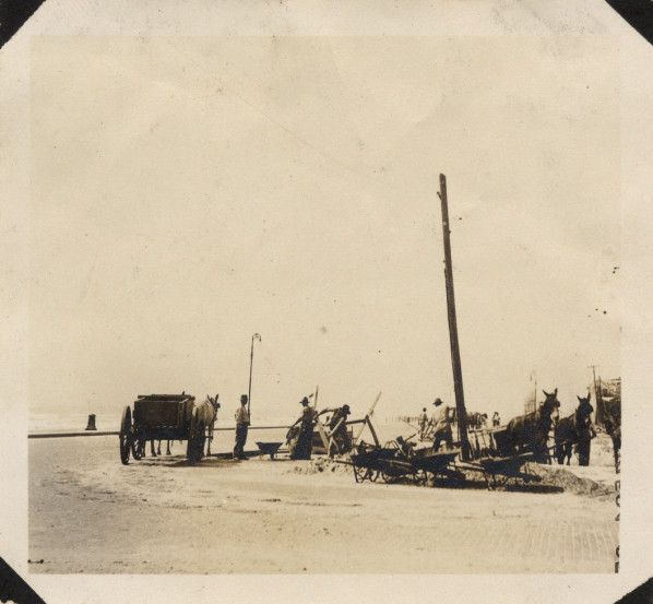 File:Workers repairing Seawall Boulevard.jpg