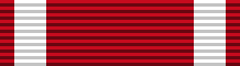 File:Cruz del Mérito Aeronáutico con distintivo rojo.png