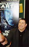 John Travolta signing copies of Battlefield Earth (novel)