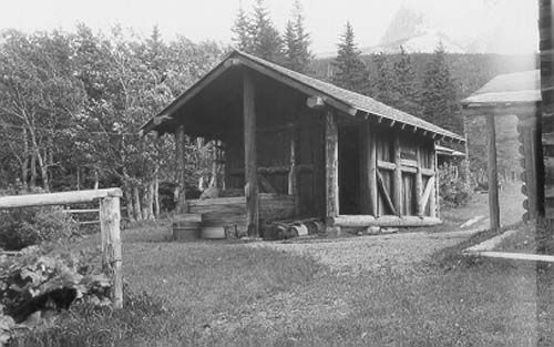 File:Belly River Ranger Station woodshed.jpg