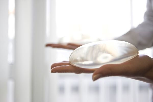 File:Breast implants in hand 01.jpg