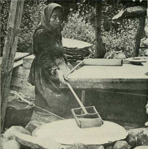 File:Norwegian peasant baking bread.png