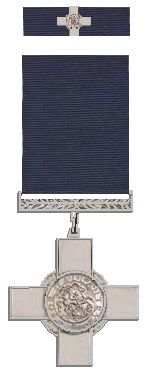 The George Cross and ribbon (plain silver cross with circular medallion in the centre depicting the effigy of St. George and the Dragon, surrounded by the words "FOR GALLANTRY")