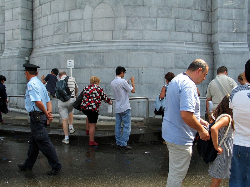 File:Lourdes collecting water 1.jpg