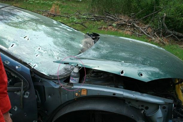 File:Tannerite placed under car hood.jpg