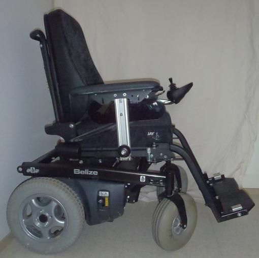 File:Electric-powered wheelchair Belize1.jpg