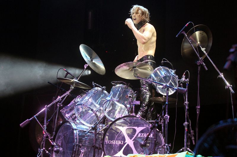 File:Yoshiki with drum kit 2011.jpg