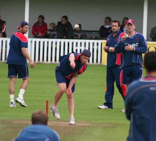 File:Somerset bowlers warming up.JPG