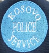 File:Kosovo Police Service cap badge 1999.png